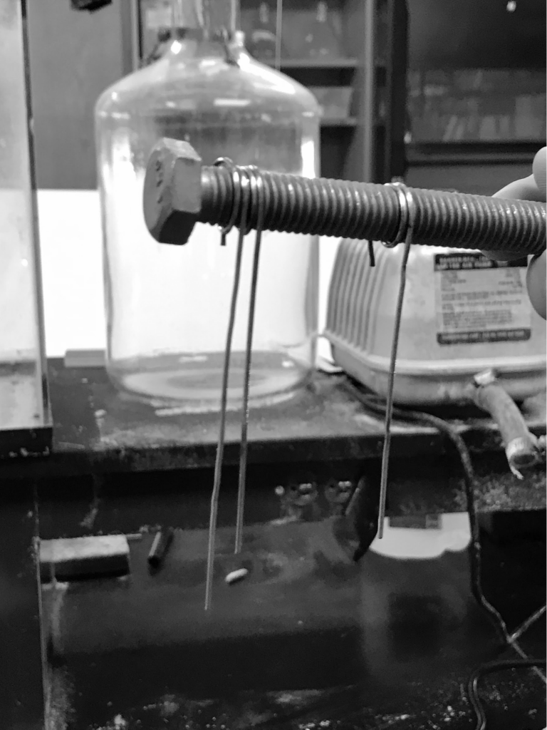 Arora & London, Figure 1: Photograph showing how connectors were made by wrapping one side around the threads of the bolt.
?