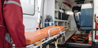man pushing a stretcher